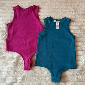 Women’s Ribbed Sleeveless Bodysuits in Teal and Magenta

NEVER BEEN WORN
